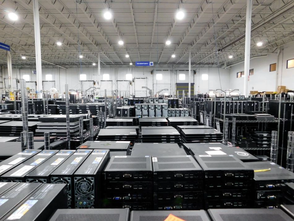 Large-scale IT asset disposition warehouse with stacked enterprise hardware